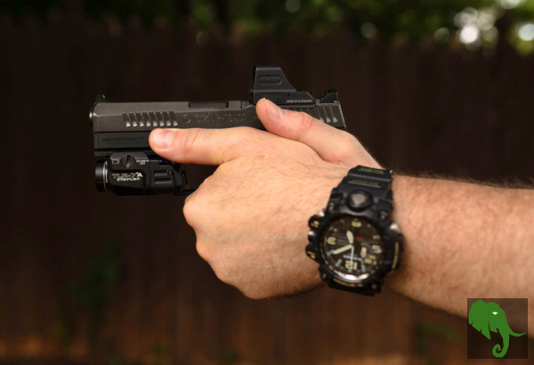 CZ P10C pistol with strong, 2-handed grip