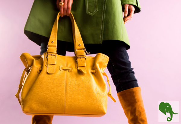 big, bright yellow purse carried by woman