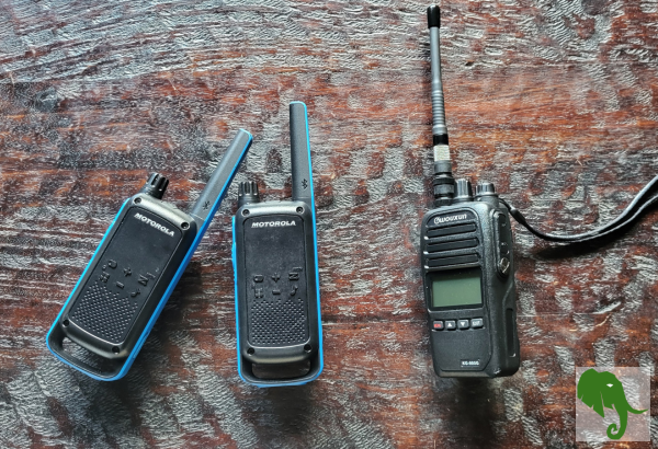 A pair of FRS radios along with a GMRS radio