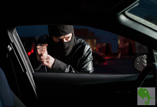 Guy in ski mask outside of driver's side window attempting to break in